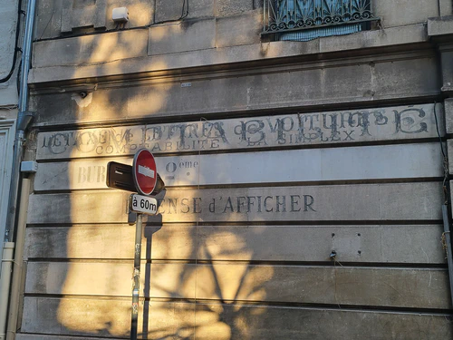 Ghost sign in Avignon